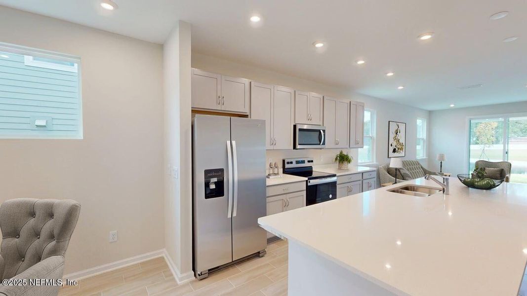 Furnished interior view inside a new home in Sandridge Hills, Green Cove Springs (Image 6).