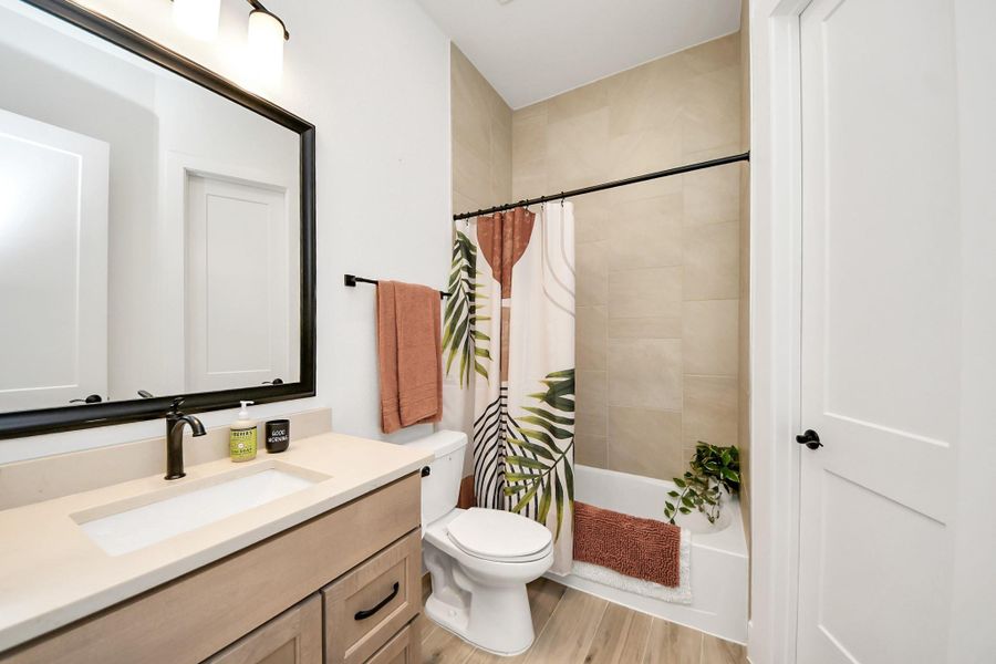 Beautiful warm tones with decorative framed mirror Beautiful warm tones with decorative framed mirror