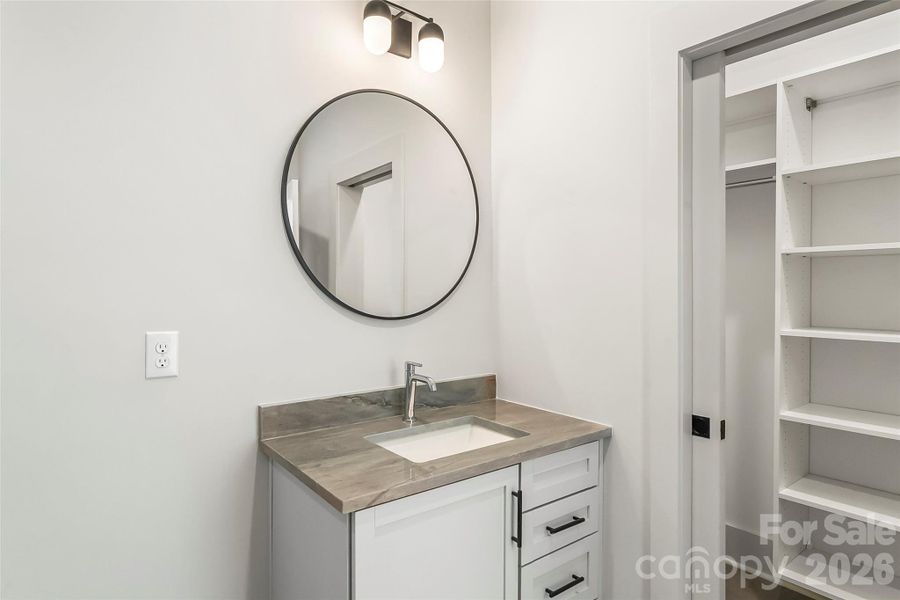 This walk-in shower has pretty tile and lots of space.