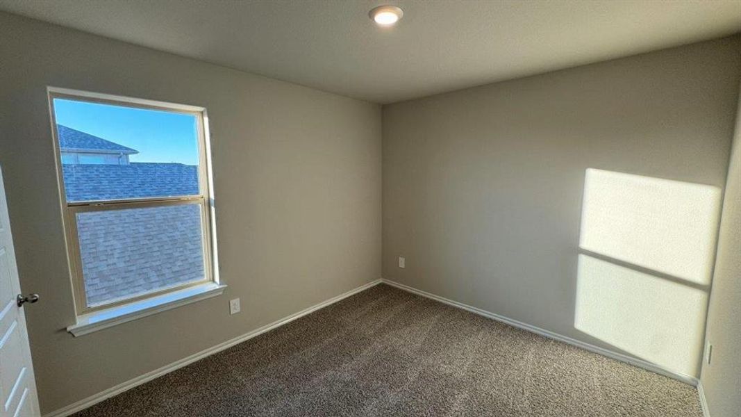 Spacious, unfurnished interior of a new home in Monarch at the Meadows, Ponder (Image 12).