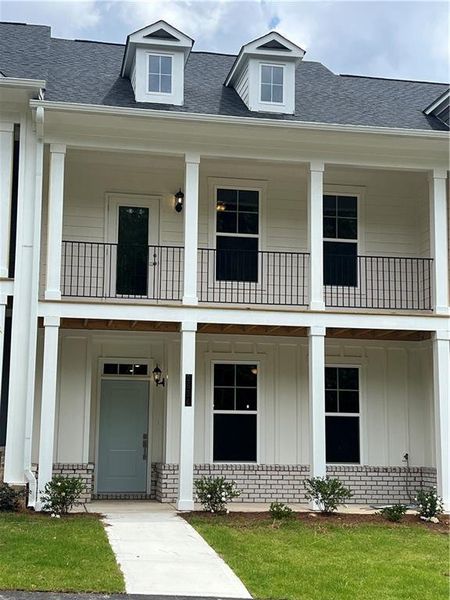 Front exterior of a new home in , Gainesville, GA, highlighting curb appeal (Image 1). Front exterior of a new home in , Gainesville, GA, highlighting curb appeal (Image 1).