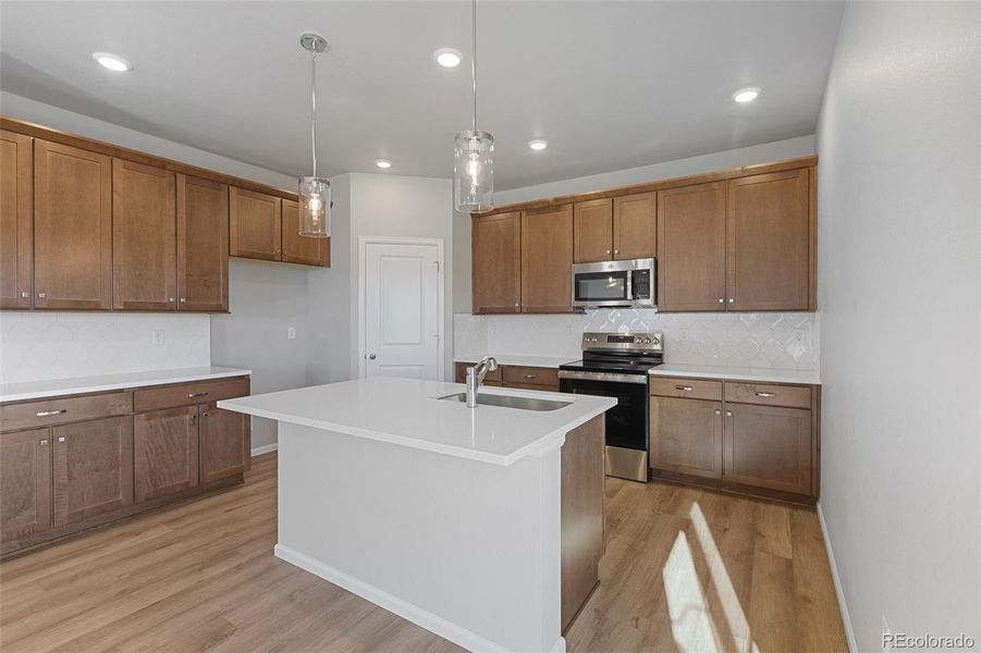 Furnished interior view inside a new home in Talon Pointe, Thornton (Image 7).