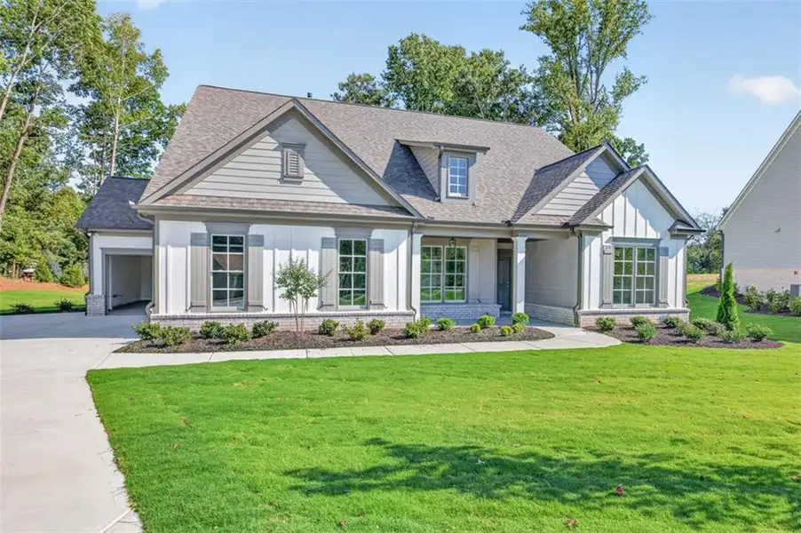 Front exterior of a new home in , Gainesville, GA, highlighting curb appeal (Image 30).