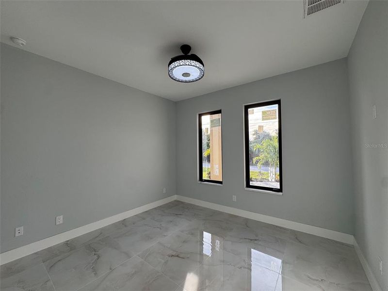 Spacious, unfurnished interior of a new home in , Port Charlotte (Image 42).
