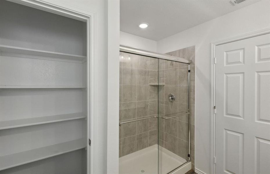 Owner's bathroom with oversized shower*real home pictured