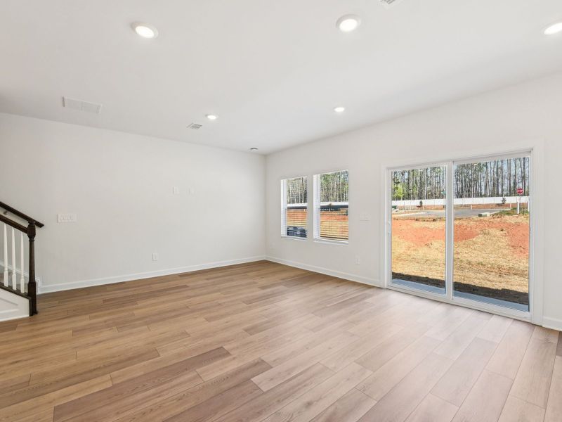 Spacious, unfurnished interior of a new home in Rocky River Towns, Charlotte (Image 10).