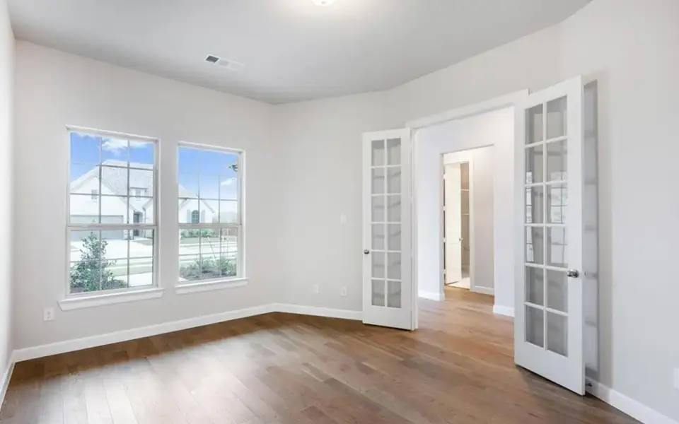 Representative unfurnished interior of a home built from the Santa Barbara by CastleRock Communities in Lakesong, Grand Prairie (Image 11).