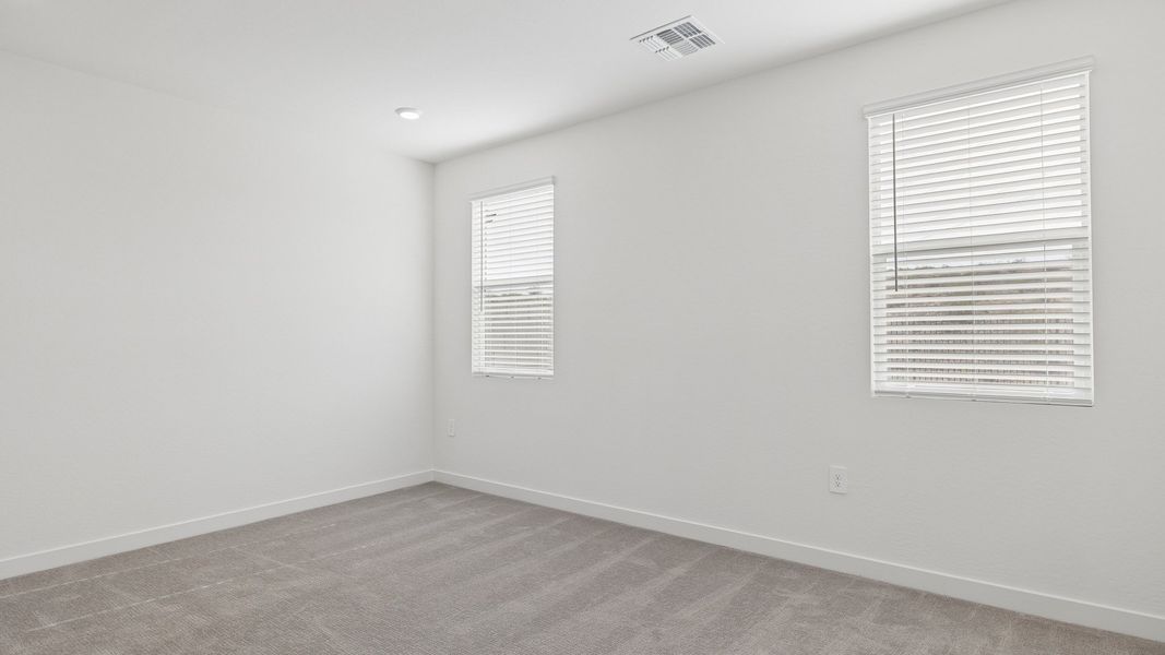 Spacious, unfurnished interior of a new home in The Ridge at Stone Butte, Phoenix (Image 24).