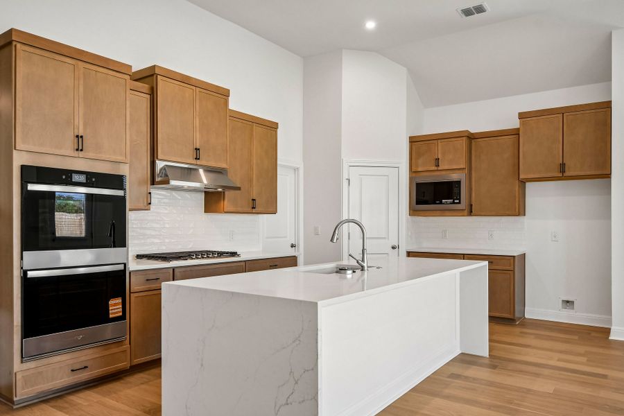 Furnished interior view inside a new home in Persimmon, Buda (Image 5).