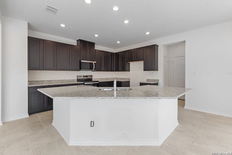 Furnished interior view inside a new home in Hidden Bluffs at TRP, San Antonio (Image 8).
