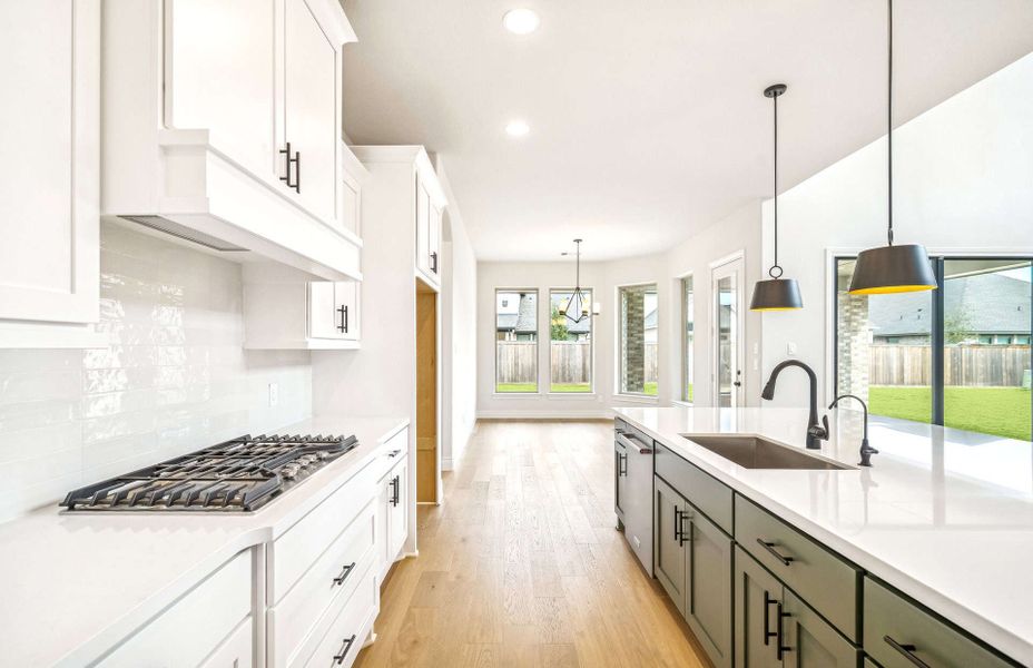 Furnished interior view inside a new home in Bridgeland 60′, Cypress (Image 8).