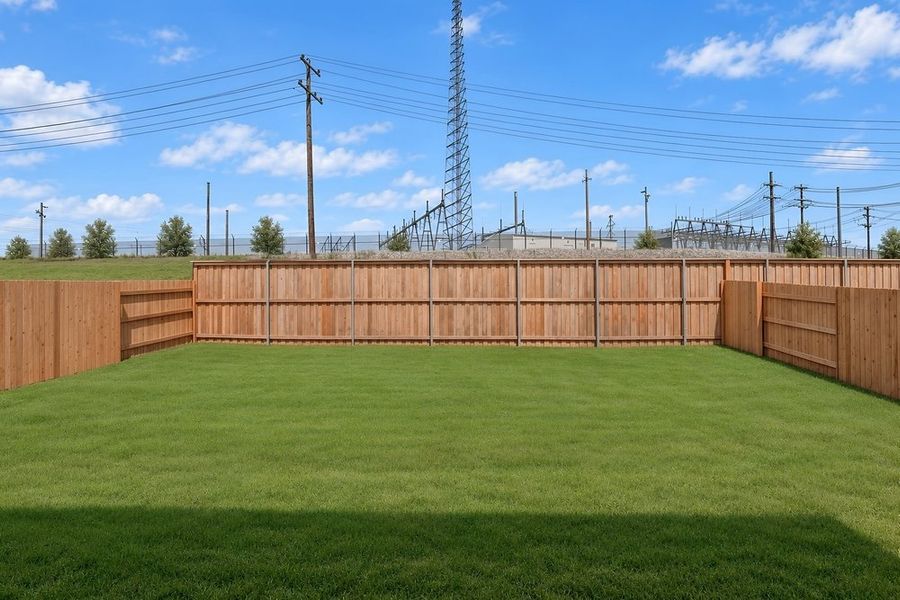 Exterior details and patio area of a home in Sunfield, Buda (Image 29).