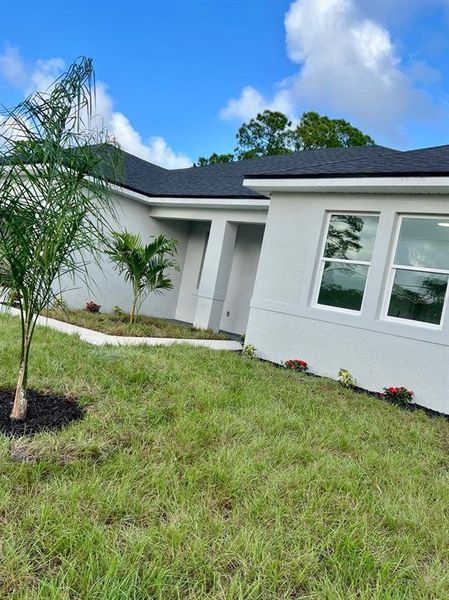Exterior details and patio area of a home in , Palm Bay (Image 4). Exterior details and patio area of a home in , Palm Bay (Image 4).