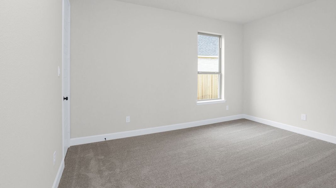 Spacious, unfurnished interior of a new home in Legacy Prairie at Katy Court, Katy (Image 27).