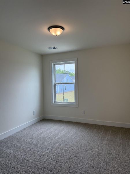 Spacious, unfurnished interior of a new home in Cottages at Roofs Pond, West Columbia (Image 45).