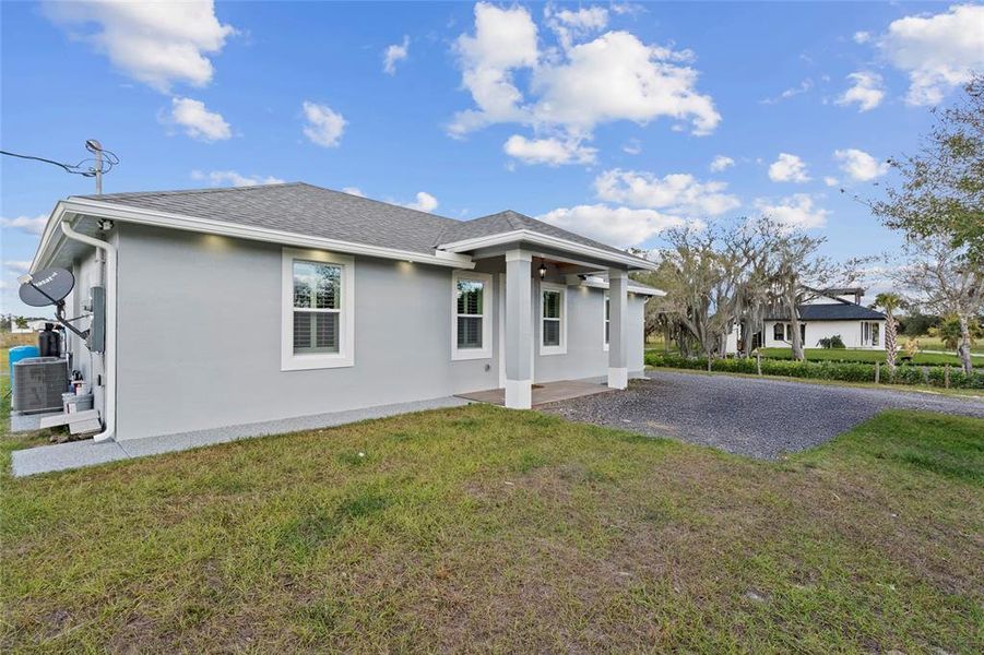 Exterior details and patio area of a home in , Okeechobee (Image 27).