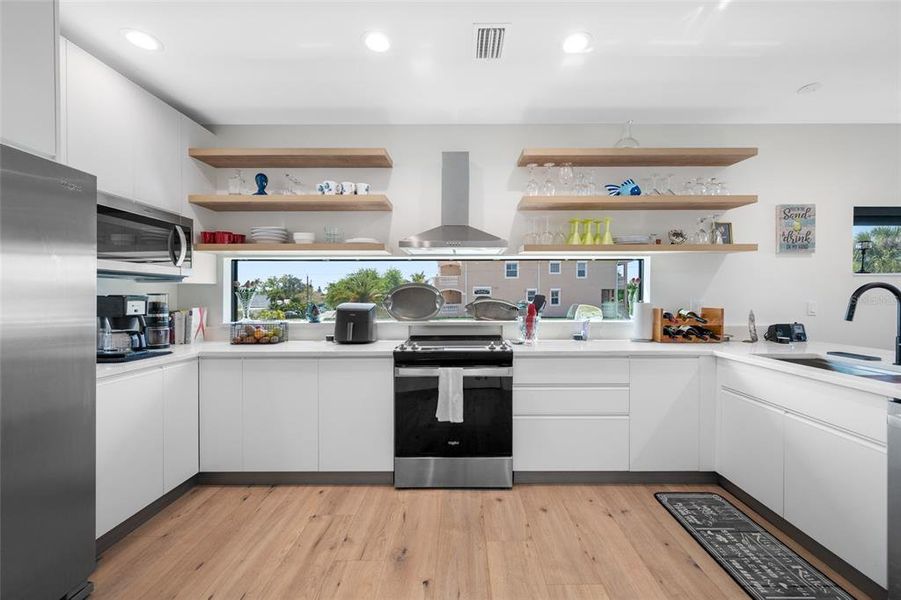 Furnished interior view inside a new home in , Indian Rocks Beach (Image 9).