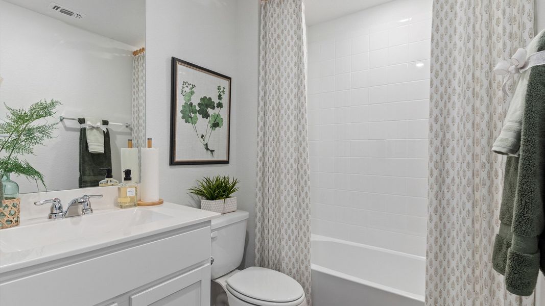 Furnished interior view inside a new home in Watermill, Kyle (Image 28).