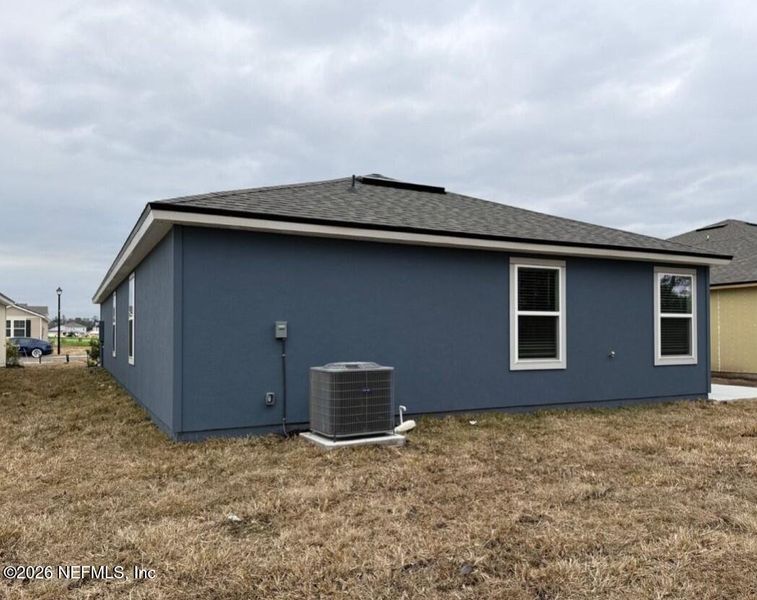 Exterior details and patio area of a home in The Arbors, Jacksonville (Image 28).