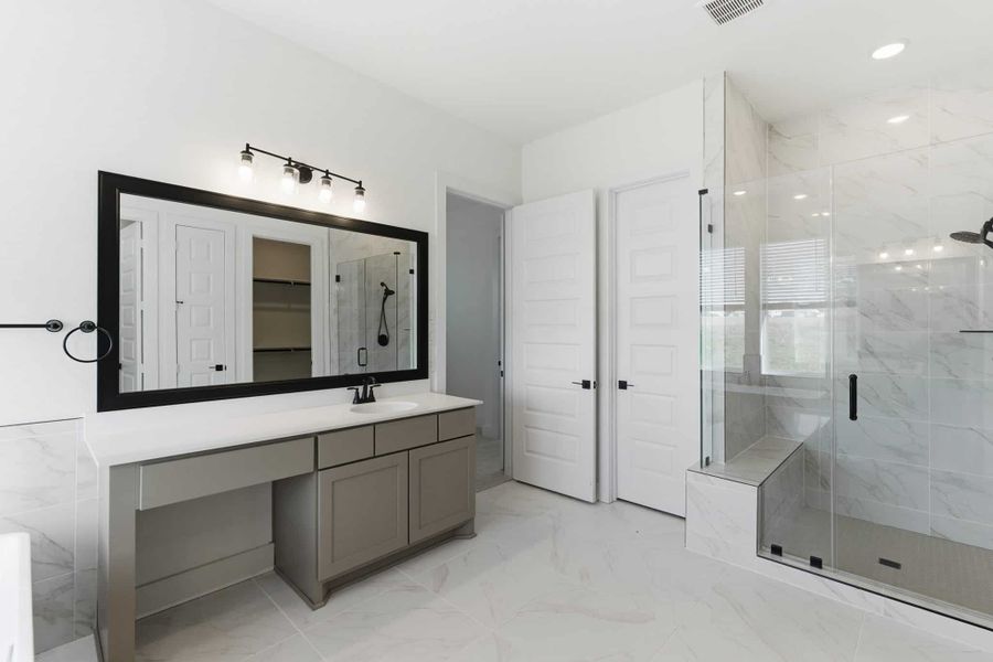 Representative furnished interior of a home built from the Malibu by Chesmar Homes in Sienna Lakes, San Antonio (Image 7).