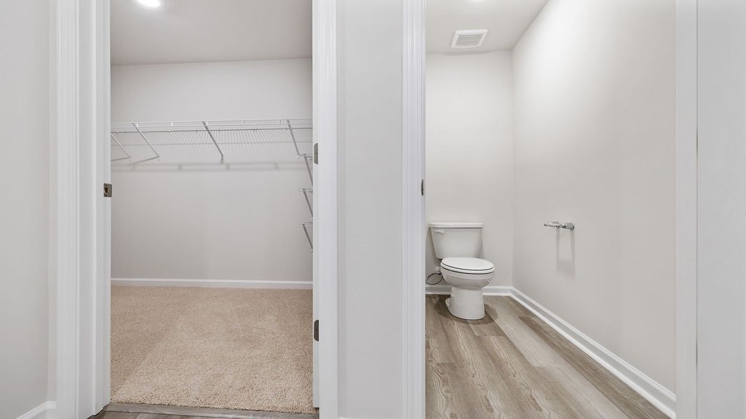 Spacious, unfurnished interior of a new home in Bentley Park, Greenwood (Image 28). Spacious, unfurnished interior of a new home in Bentley Park, Greenwood (Image 28).