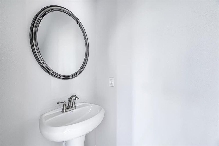 Powder bath under the stairs.