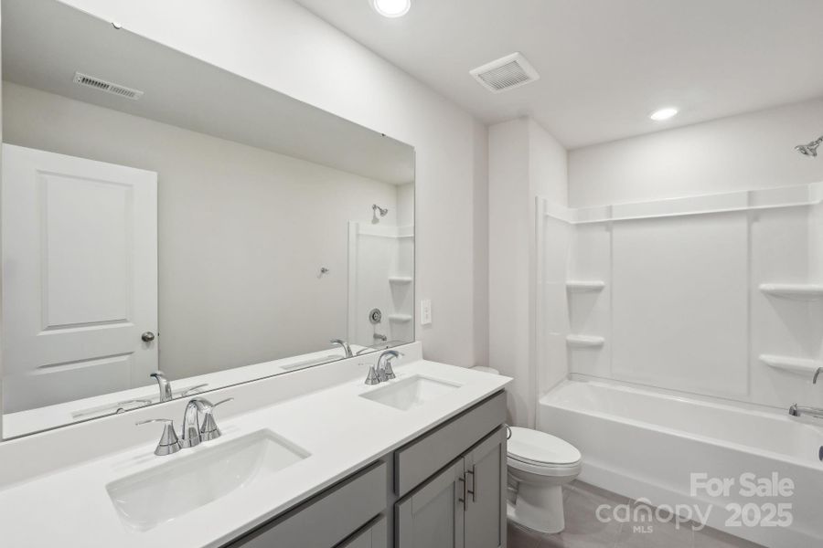 Photo is not of the actual home but is an inspirational photo of builder’s model home and may depict options, furnishings, and/or decorator features that are not included. Photo is not of the actual home but is an inspirational photo of builder’s model home and may depict options, furnishings, and/or decorator features that are not included.