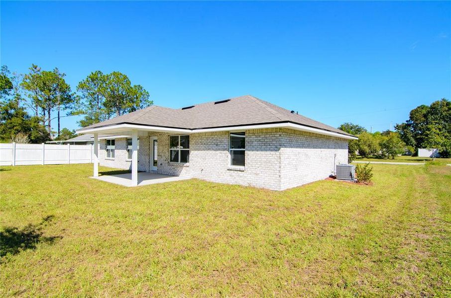 Exterior details and patio area of a home in Palm Coast, Palm Coast (Image 21). Exterior details and patio area of a home in Palm Coast, Palm Coast (Image 21).