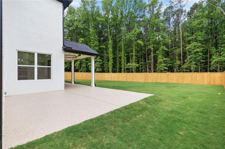 Front exterior of a new home in , Lilburn, GA, highlighting curb appeal (Image 27).