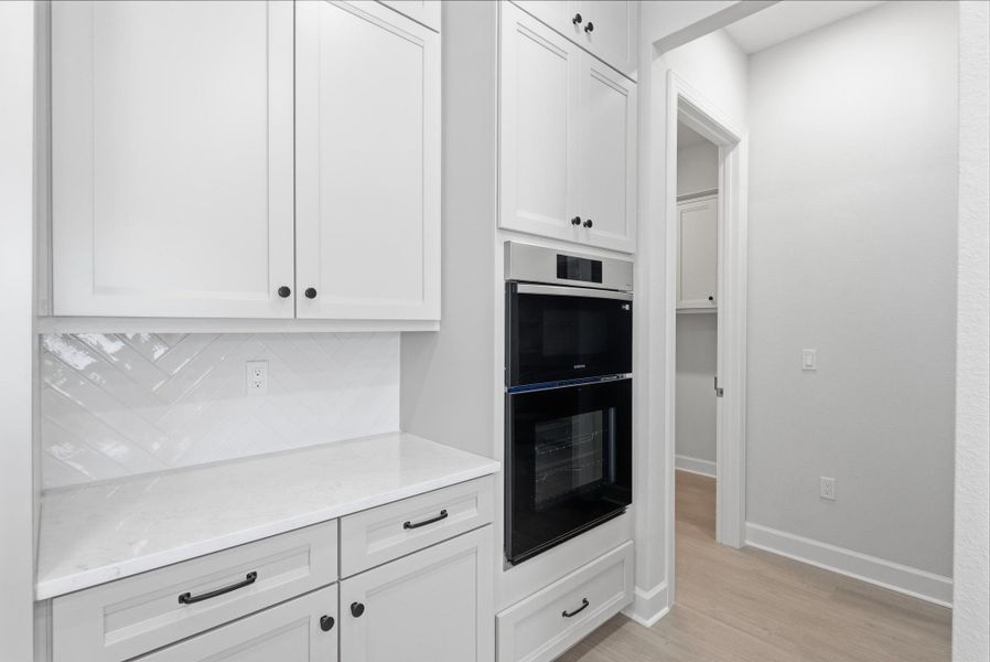 Representative furnished interior of a home built from the Bayview by SeaGate Homes in Beachview Cove, Ormond Beach (Image 42).