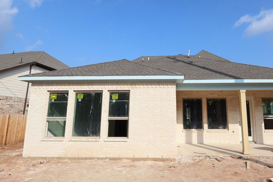 In-progress construction of a new home in Escondido 60' Homesites, Magnolia, TX (Image 3).