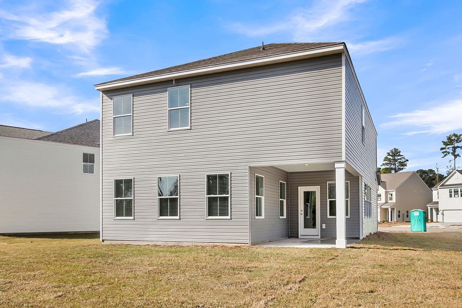 Exterior details and patio area of a home in Wildcat Chase, Summerville (Image 2).