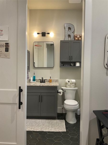 Bedroom 4 has ensuite private bath, walk in closet, large shower with seat, ceiling fan, slider door