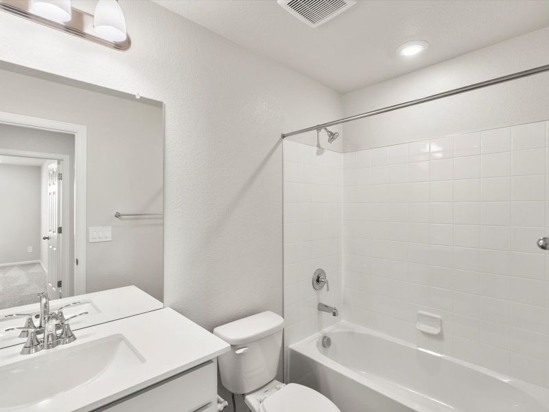 Furnished interior view inside a new home in Buffalo Highlands: The Flora Collection, Commerce City (Image 6).