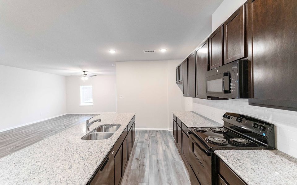 Furnished interior view inside a new home in The Grove, Sherman (Image 5).