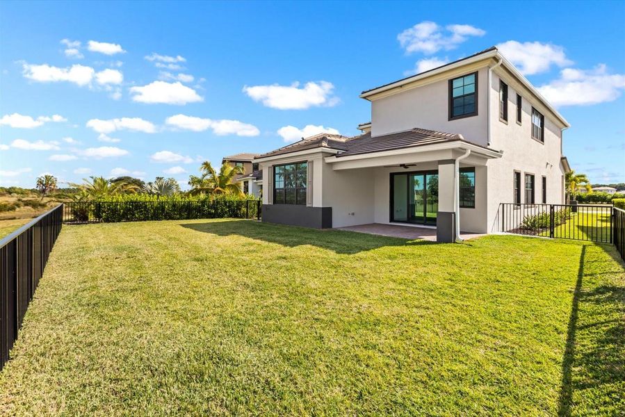 Exterior details and patio area of a home in Tesoro Club, Port St. Lucie (Image 3).
