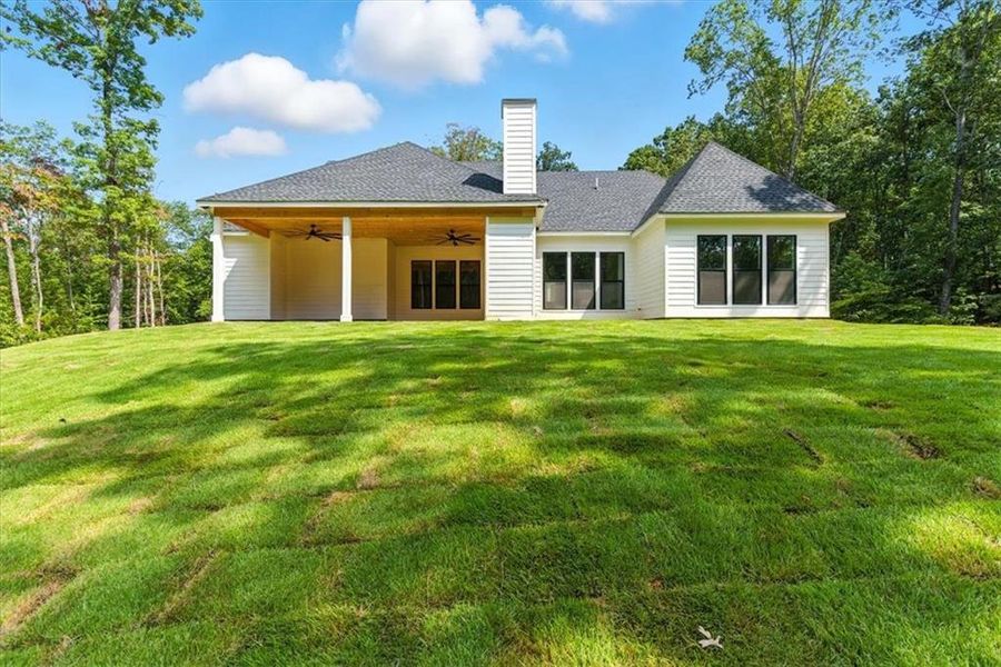 Front exterior of a new home in , Canton, GA, highlighting curb appeal (Image 19).