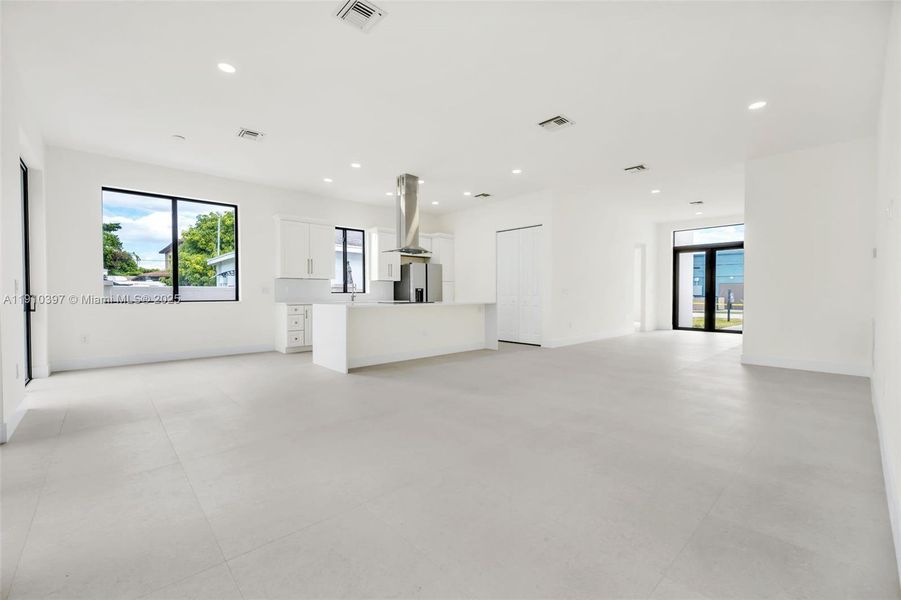 Kitchen Island opens to living room and dining area. Kitchen Island opens to living room and dining area.