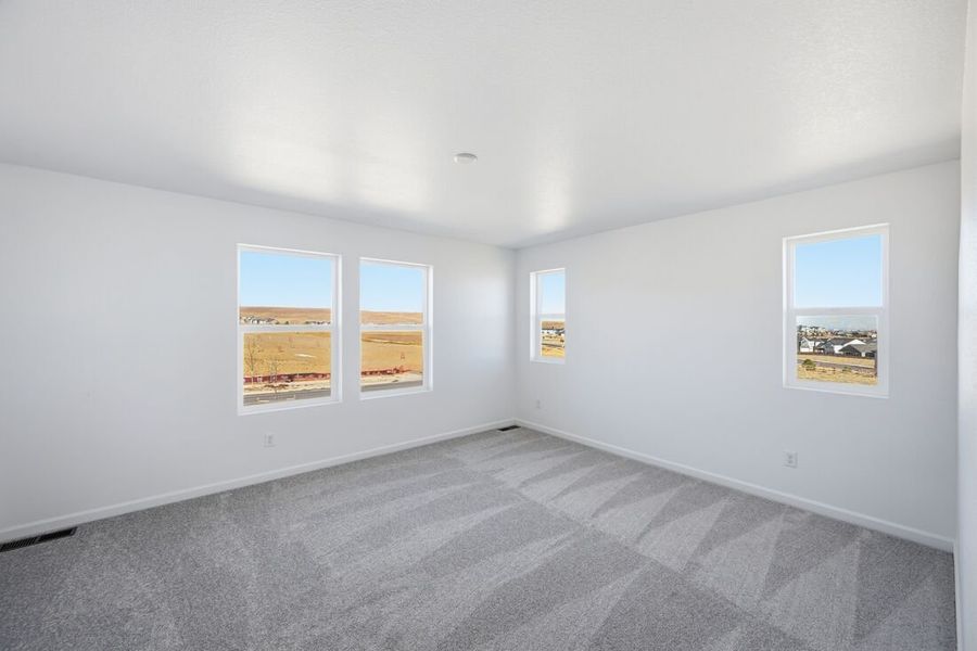 Spacious, unfurnished interior of a new home in Trailstone Town Collection, Arvada (Image 23).