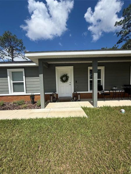 Front exterior of a new home in , Ocala, FL, highlighting curb appeal (Image 1). Front exterior of a new home in , Ocala, FL, highlighting curb appeal (Image 1).