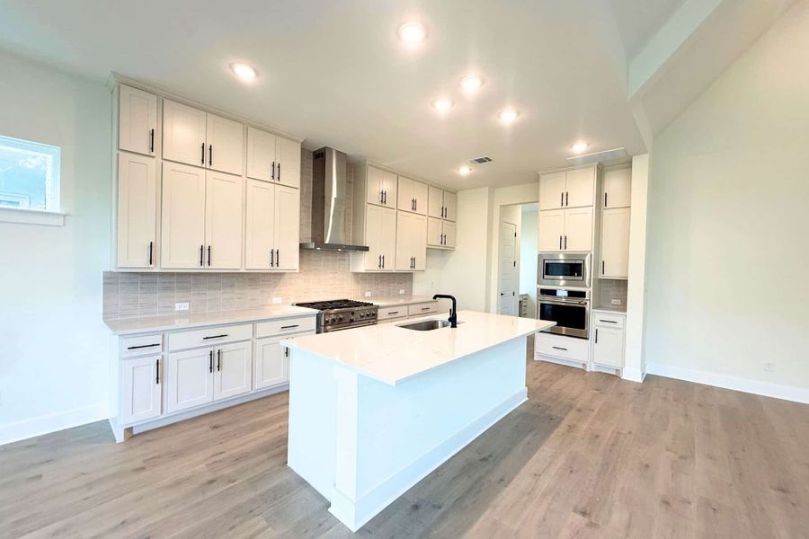 Furnished interior view inside a new home in Heights at San Gabriel, Georgetown (Image 6).