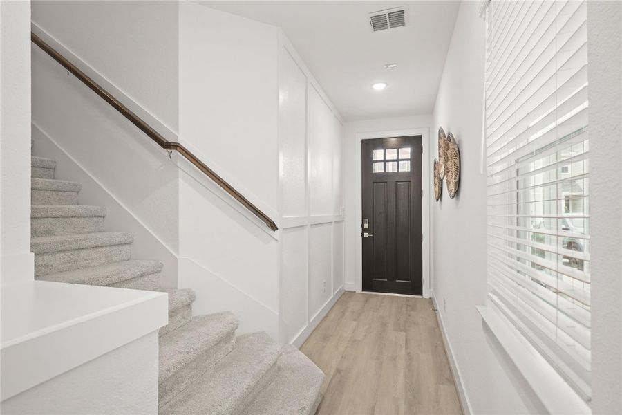 Inviting foyer with feature wall (*Photo not of actual home and used for illustration purposes only.)