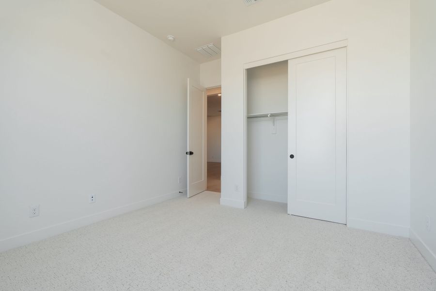 Representative unfurnished interior of a home built from the Aurora Plan 9001 by Tri Pointe Homes in Emberly, Gilbert (Image 47). Representative unfurnished interior of a home built from the Aurora Plan 9001 by Tri Pointe Homes in Emberly, Gilbert (Image 47).