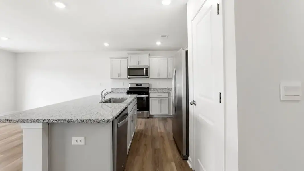Furnished interior view inside a new home in Waverly Station, Greenwood (Image 9).