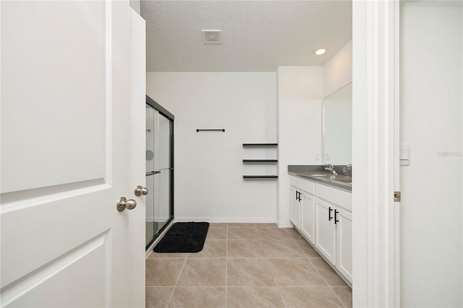 Furnished interior view inside a new home in Westgate at Avalon Park, Wesley Chapel (Image 35).