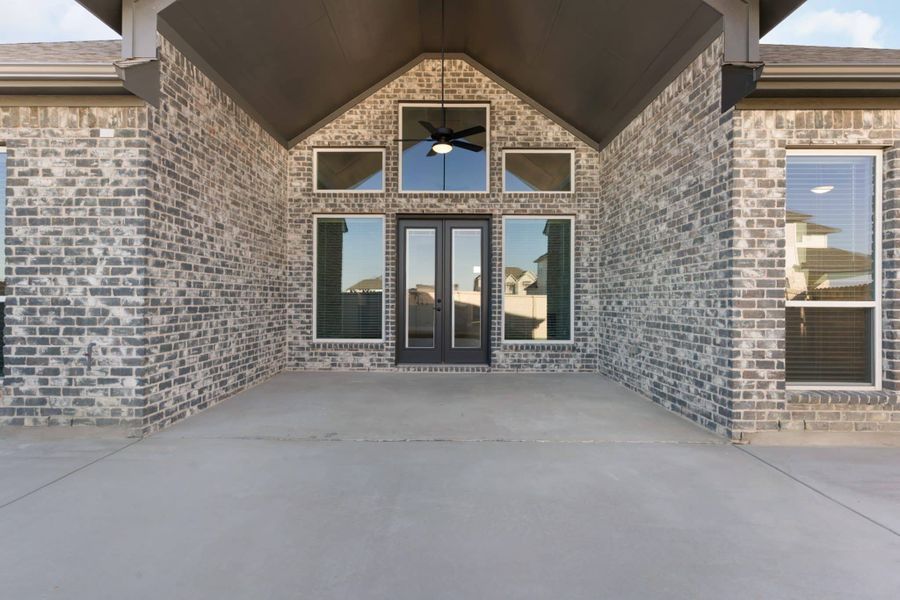 Exterior details and patio area of a home in The Grove at Blackhawk, Pflugerville (Image 3).