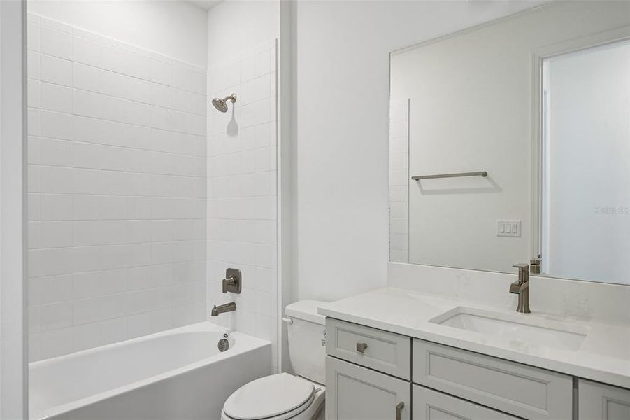 Furnished interior view inside a new home in Grand Park, Sarasota (Image 10).