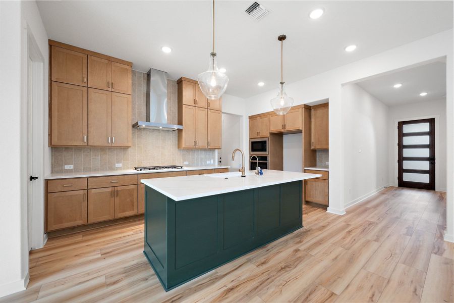 Furnished interior view inside a new home in Wolf Ranch, Georgetown (Image 11).
