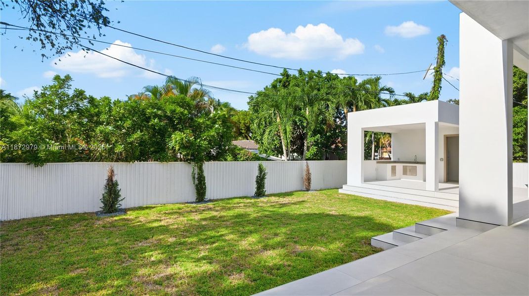 Exterior details and patio area of a home in , Miami Springs (Image 20).