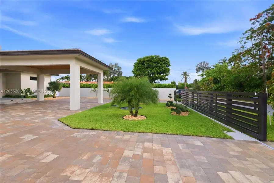Exterior details and patio area of a home in , Miami (Image 4). Exterior details and patio area of a home in , Miami (Image 4).